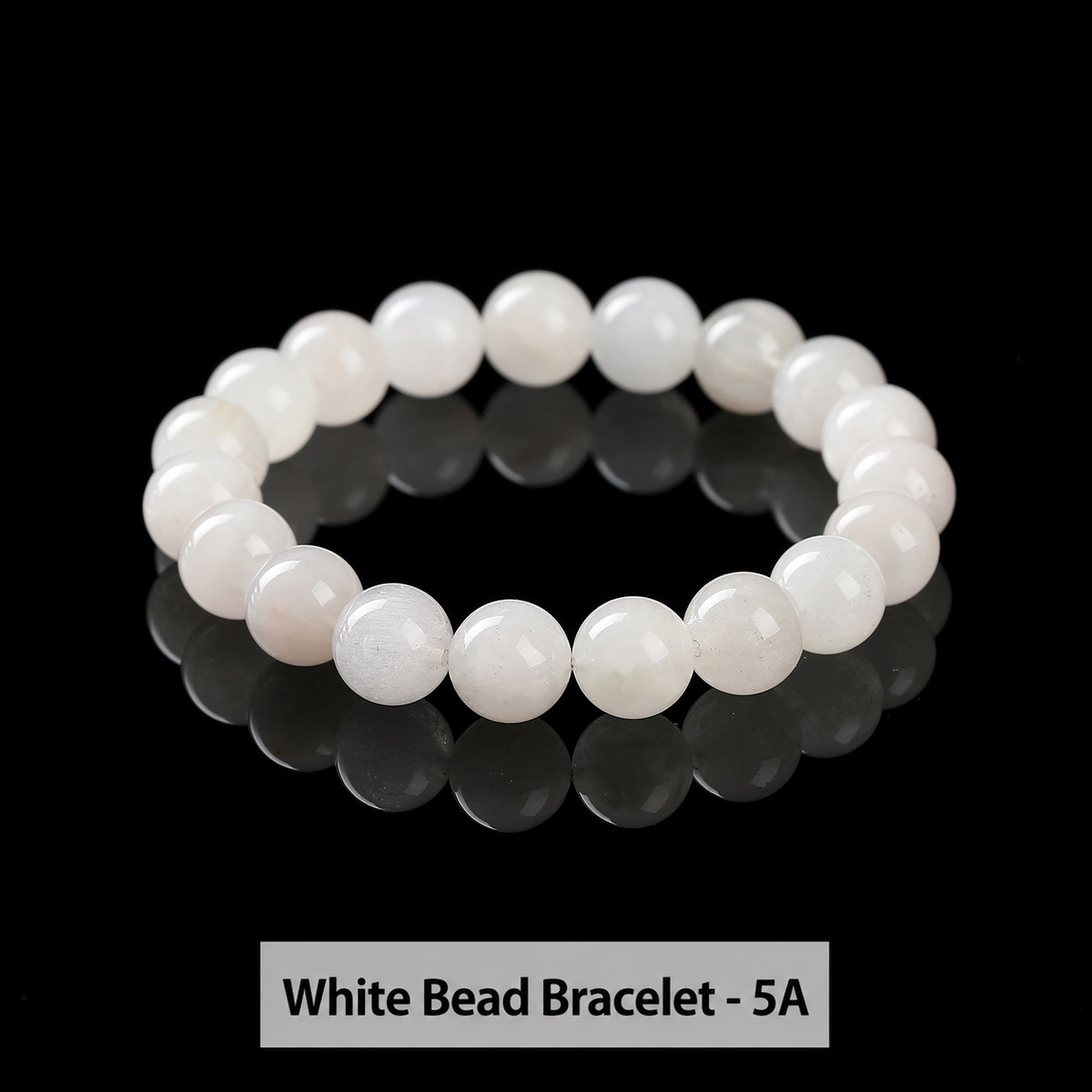 Round bead bracelet showing its polished surface and internal patterns