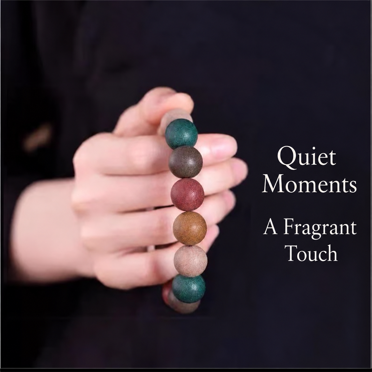 Herbal incense beads held for a close-up view