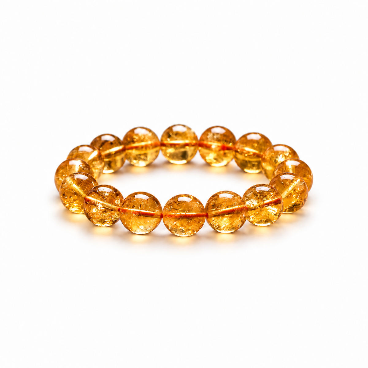 Golden crystal bracelet on white background