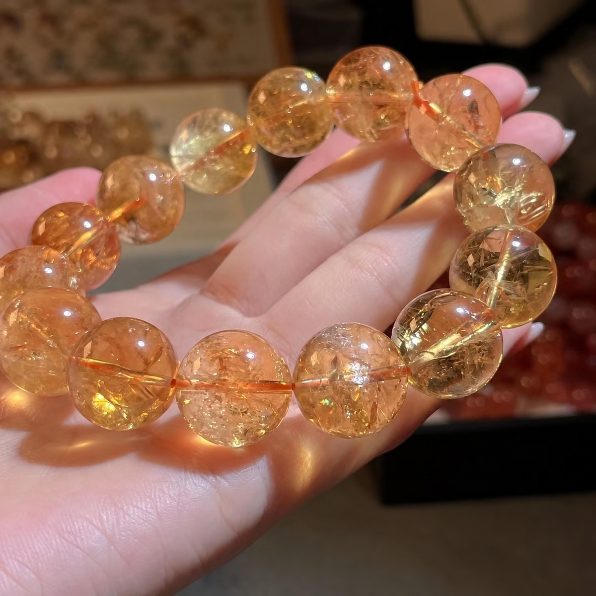 Golden crystal beads and internal textures in hand