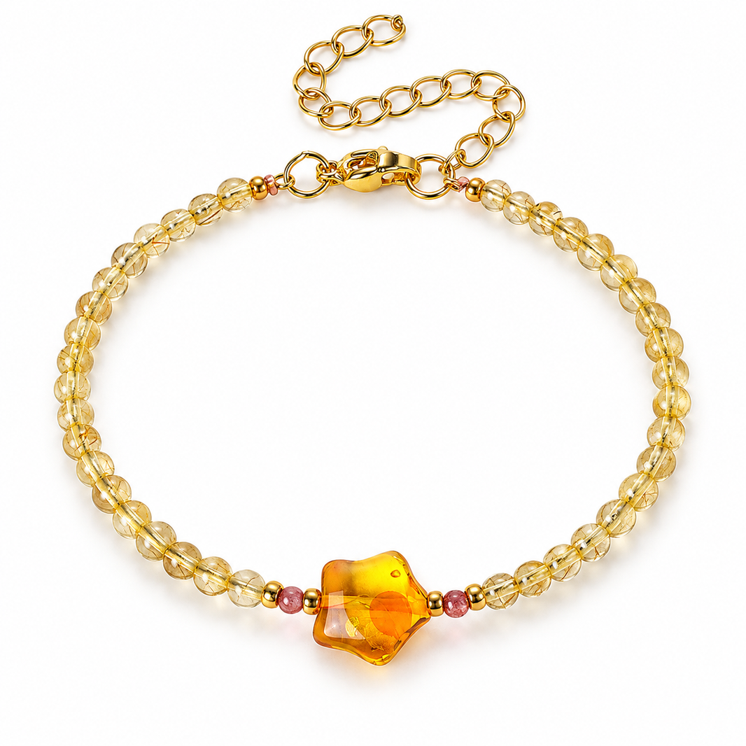 3mm golden rutilated quartz bracelet with amber star centerpiece on white