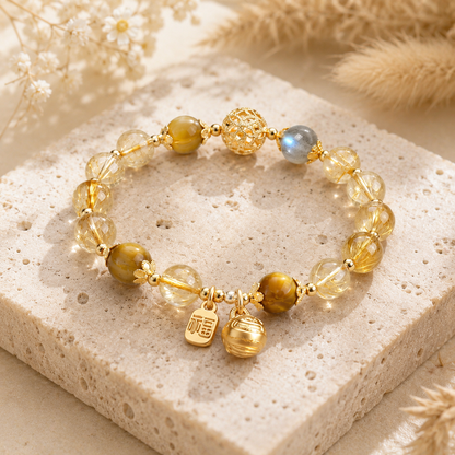 Golden Rutilated Quartz, Tiger Eye & Moonstone Bracelet – travertine and dried-flower still life