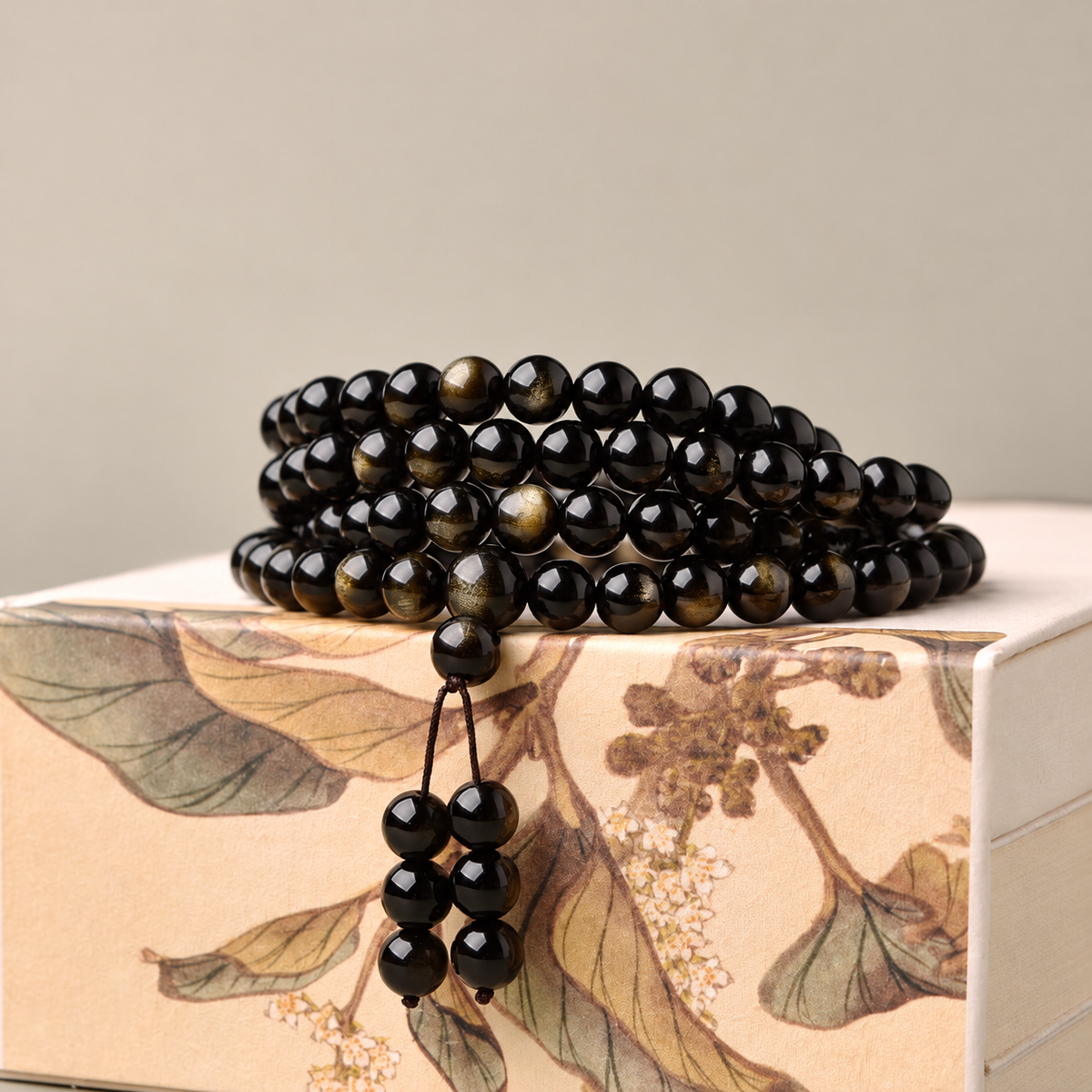 Golden sheen obsidian bracelet in a stacked wrap arrangement