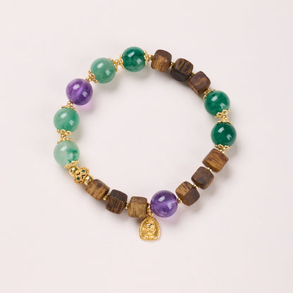 10mm green stone bracelet with wood, purple beads and Buddha charm