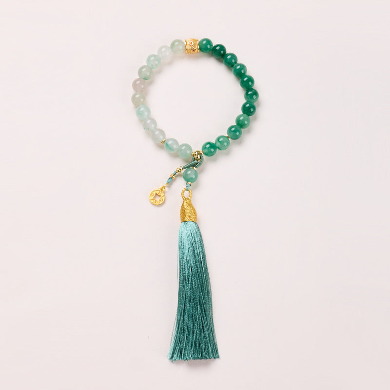 8mm green stone bracelet with coin charm and teal tassel
