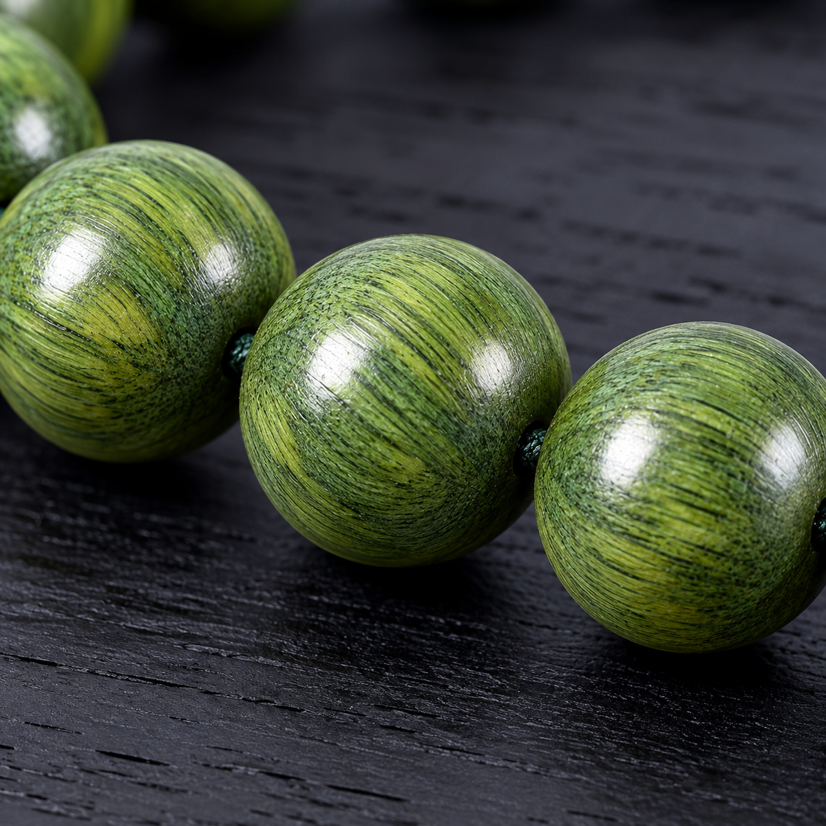 Close-up of green woodgrain beads