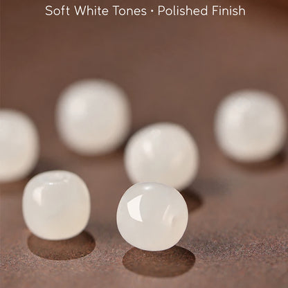 Milky-white Hetian jade barrel bead polished finish detail