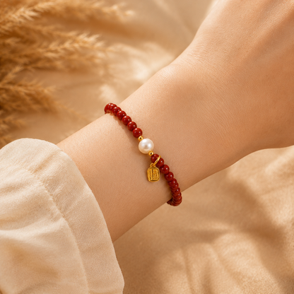 Imperial Cinnabar & Freshwater Pearl Bracelet – realistic on-wrist view