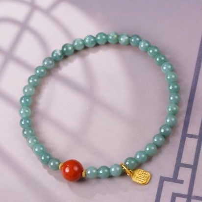 Blue-green jadeite and nanhong agate bracelet with gold-colored Fu charm