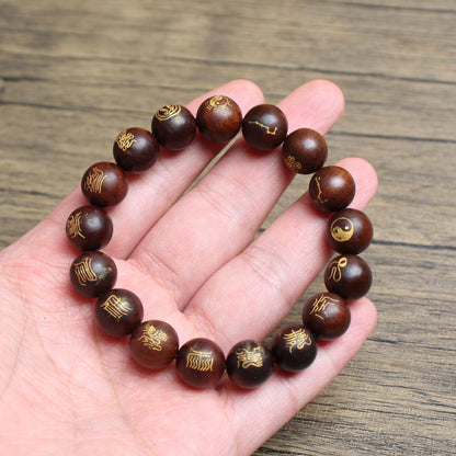 Jujube wood bead bracelet resting on a hand