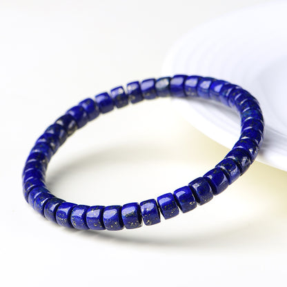 Side view of polished lapis lazuli disc bead bracelet