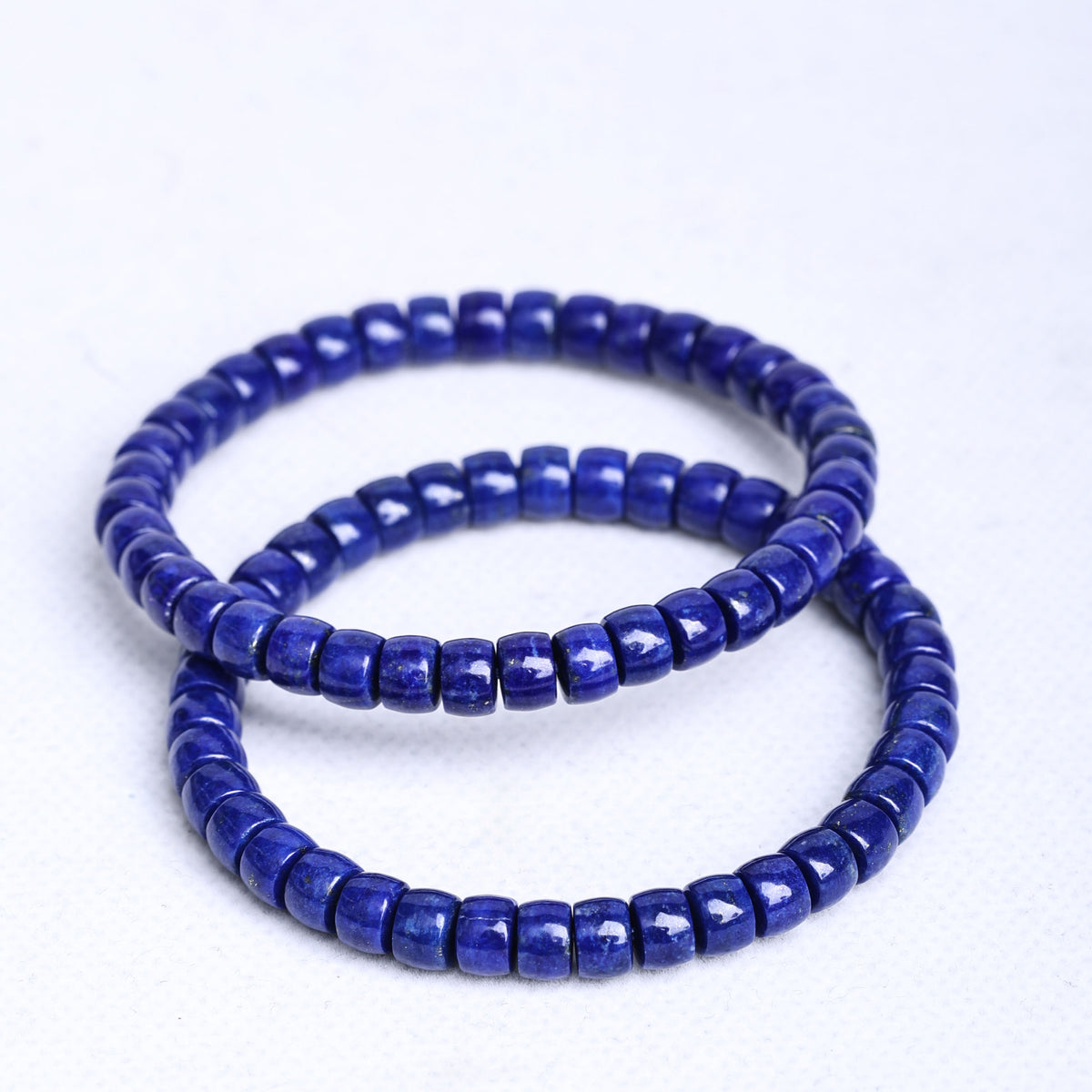 Lapis lazuli bracelets shown for detail; sold individually