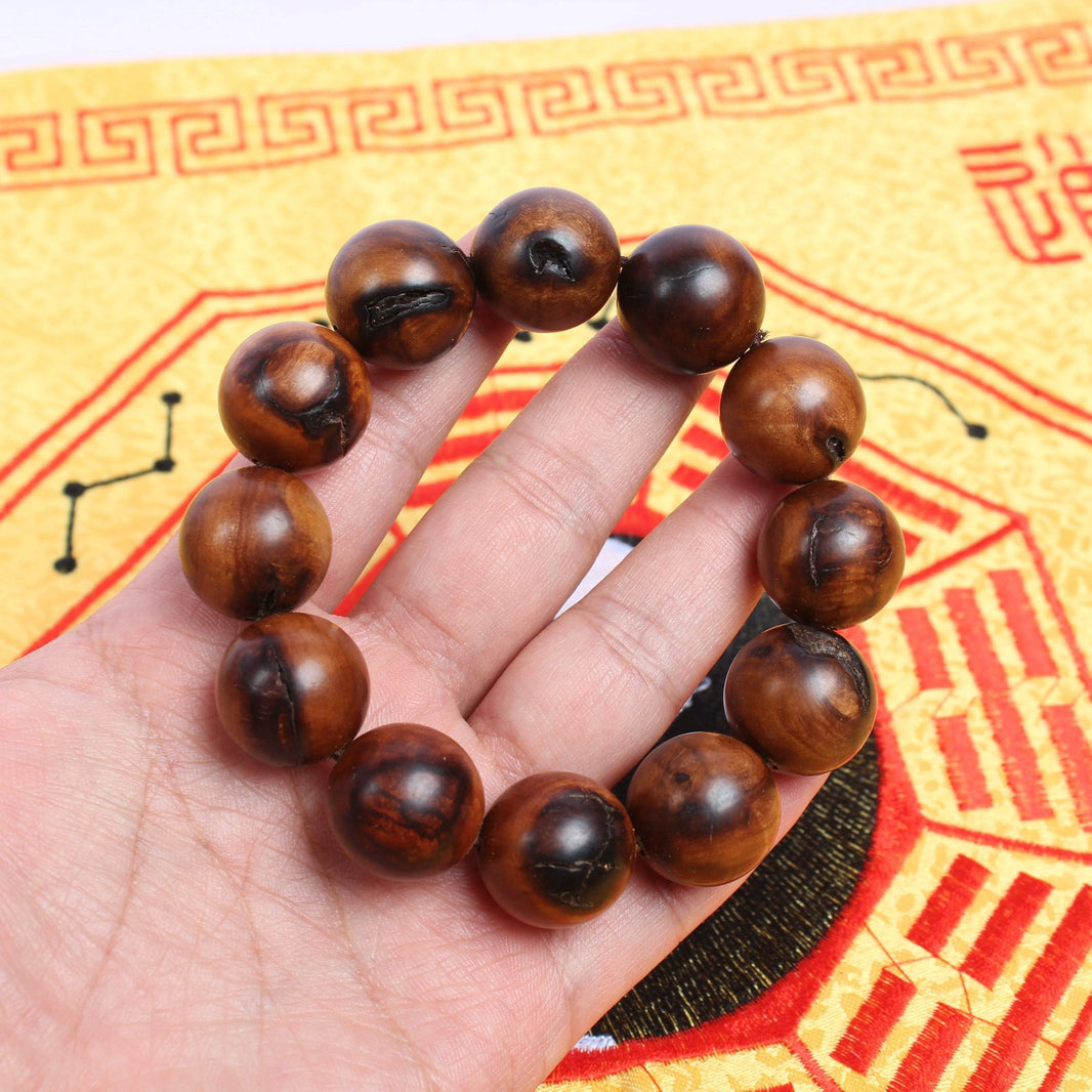 Jujube wood bracelet shown on a hand