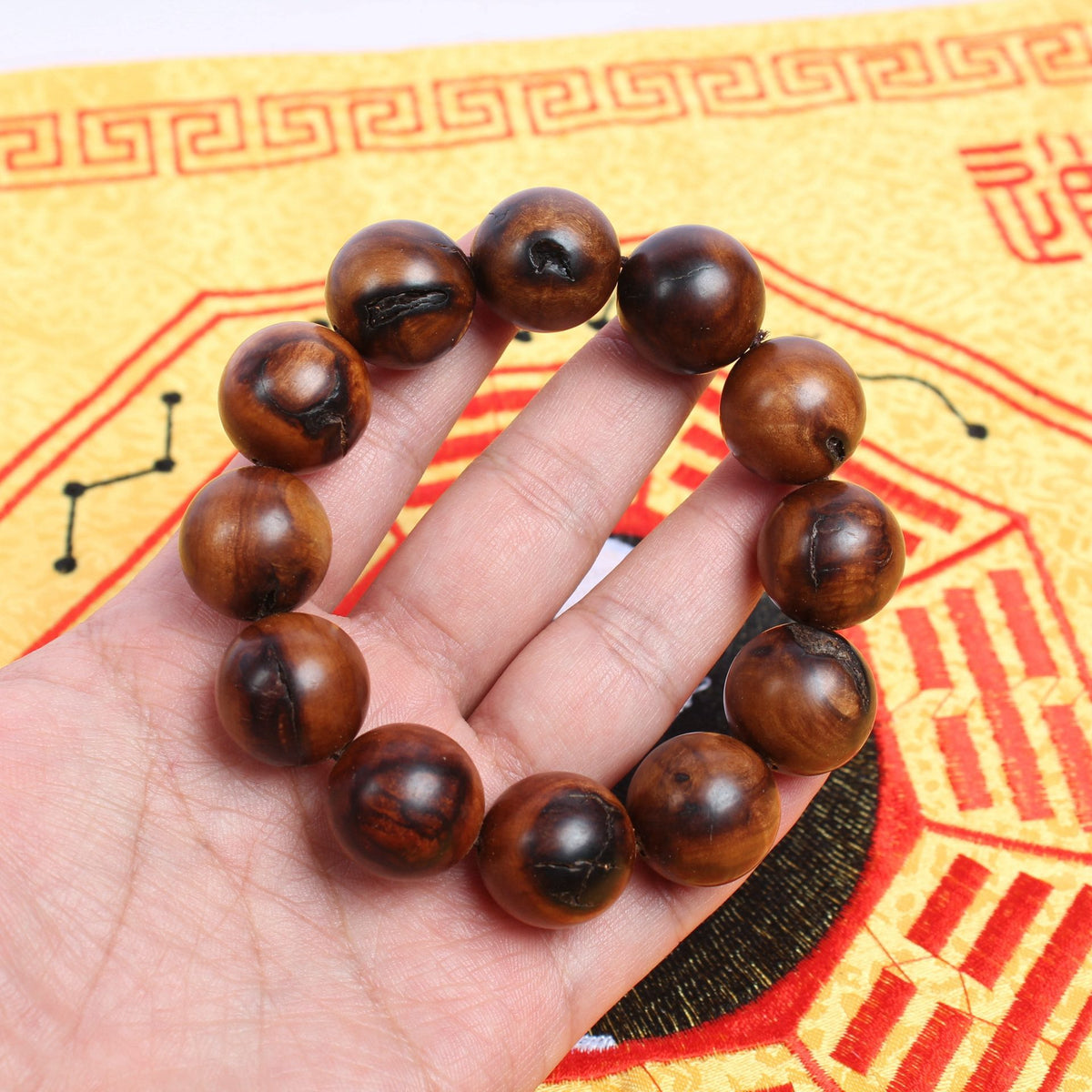 Jujube wood bracelet shown on a hand