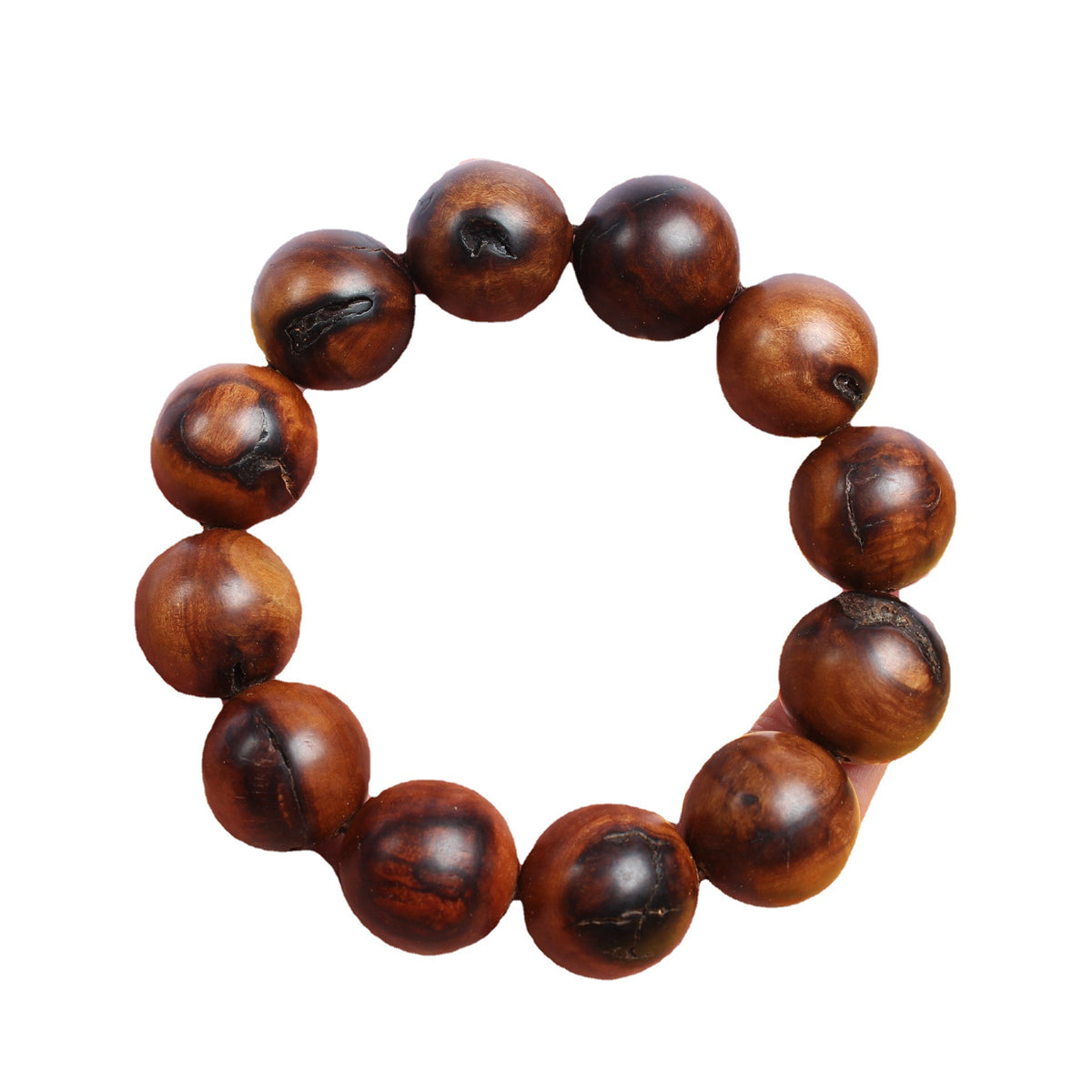 Jujube wood twelve-bead bracelet against white