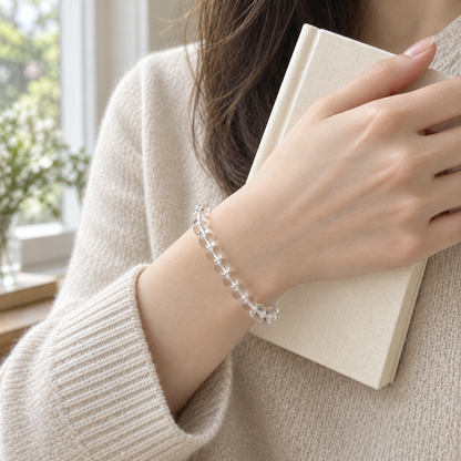 Natural Clear Quartz Minimalist Bracelet – window and book wrist view