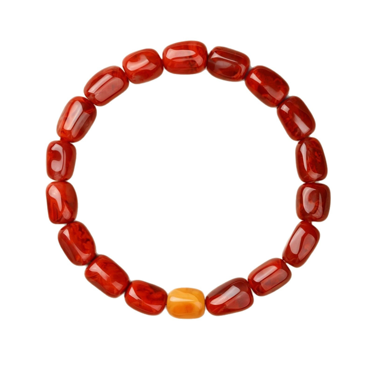 Red agate and amber bracelet photographed from above on white