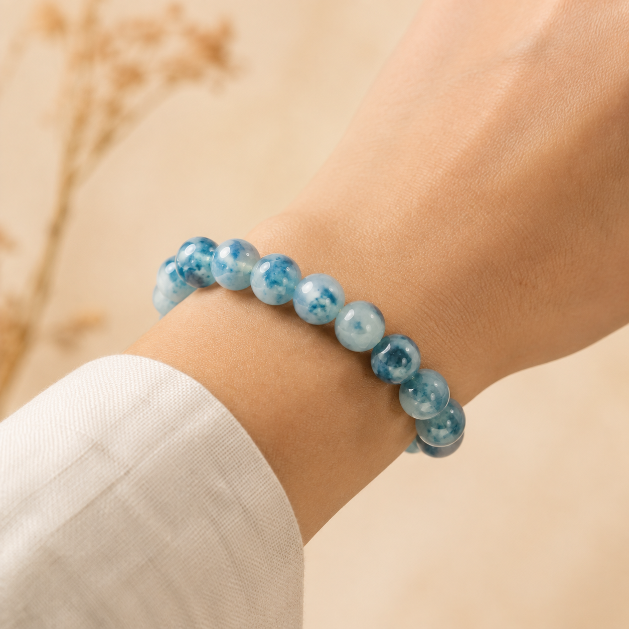 Natural icy blue water jadeite floating flower bracelet – on-wrist view