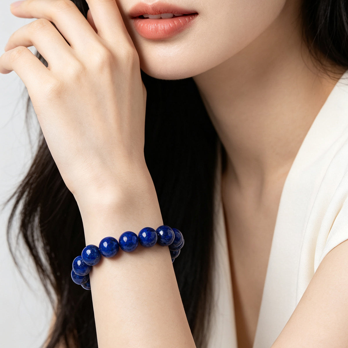 Natural lapis lazuli bracelet worn on wrist