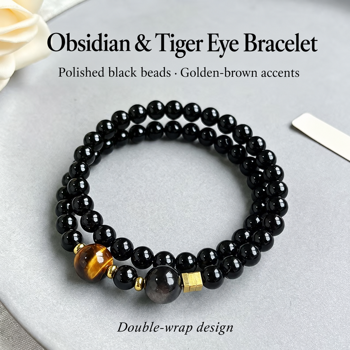 Obsidian and tiger eye double-wrap bracelet showing gold-tone accents