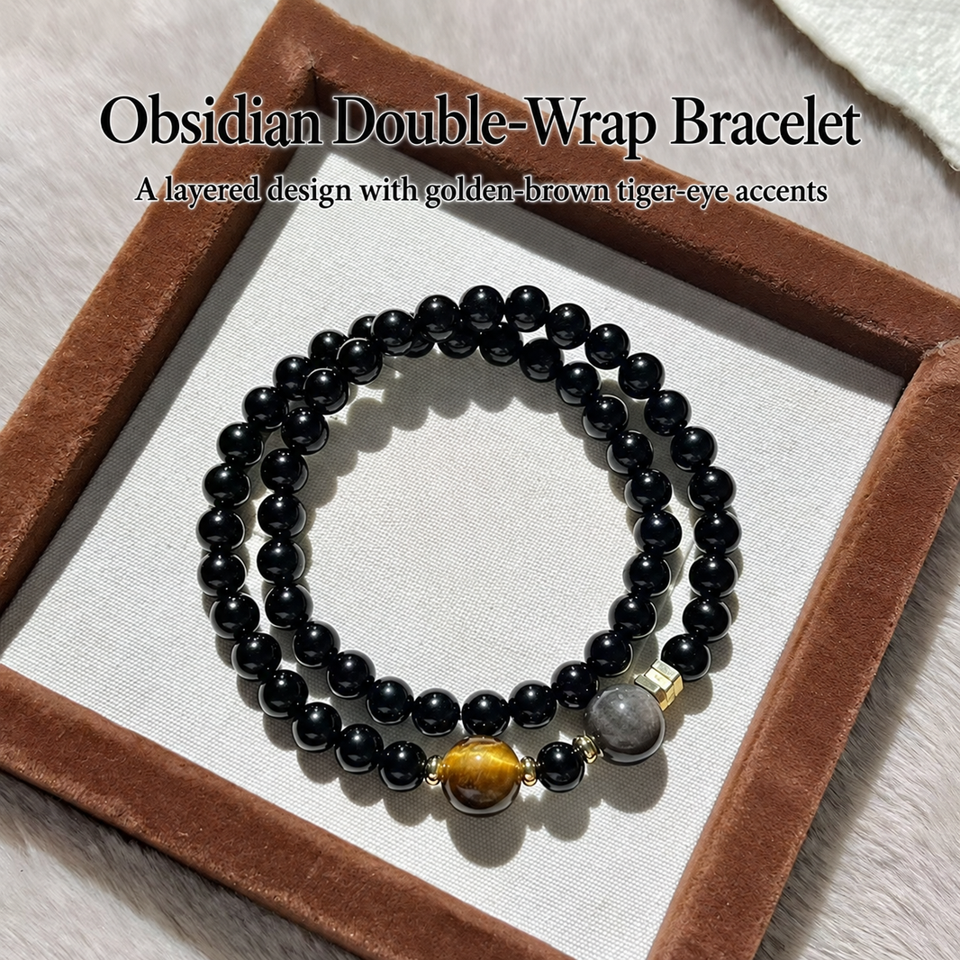 Obsidian and tiger eye double-wrap bracelet showing gold-tone accents