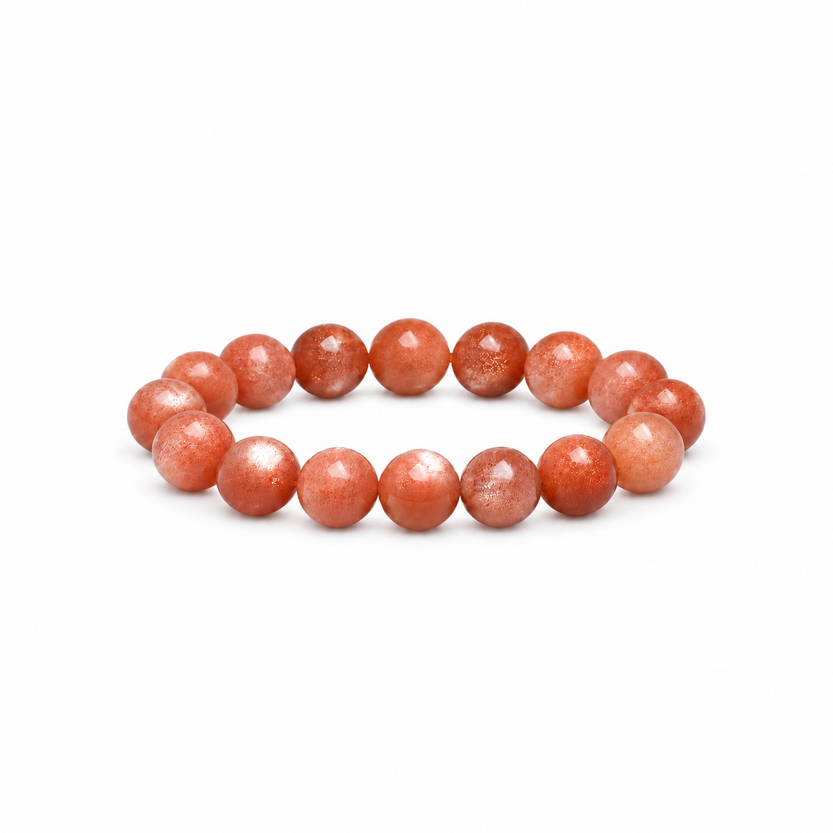 Orange moonstone round bead bracelet on white background