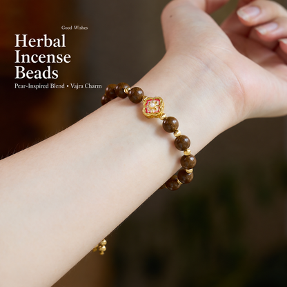 Pear incense bracelet worn on wrist