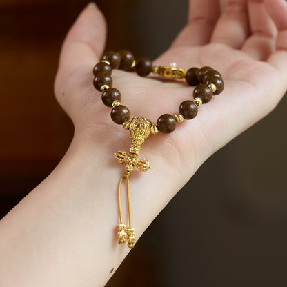 Floral enamel and gold-tone charm details