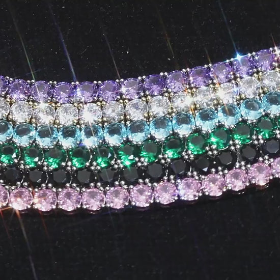Colored zircon tennis-chain jewelry showing round stones and prong settings