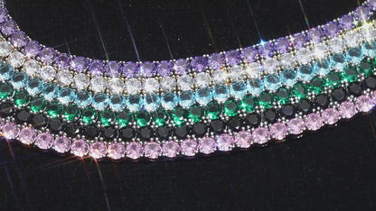 Colored zircon tennis-chain jewelry showing round stones and prong settings