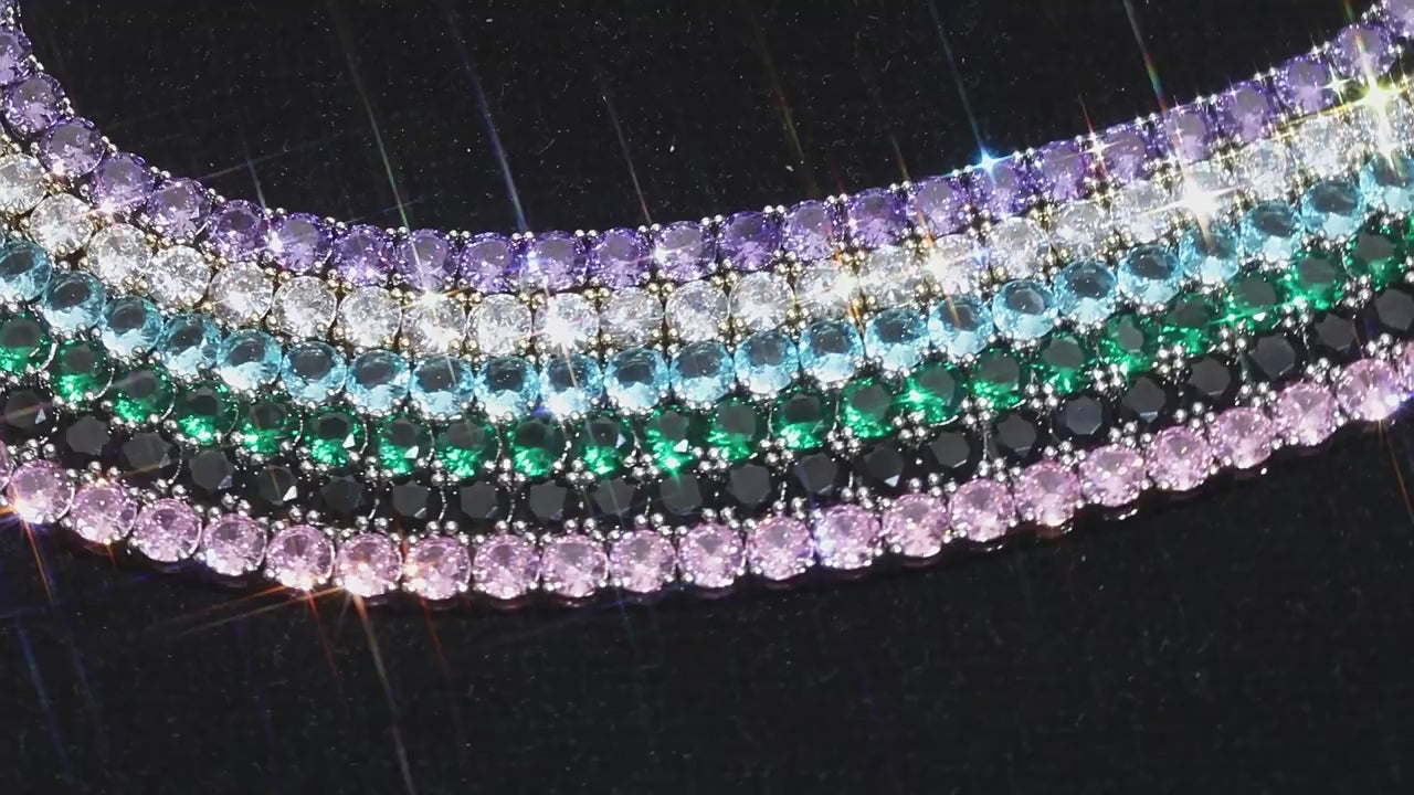 Colored zircon tennis-chain jewelry showing round stones and prong settings
