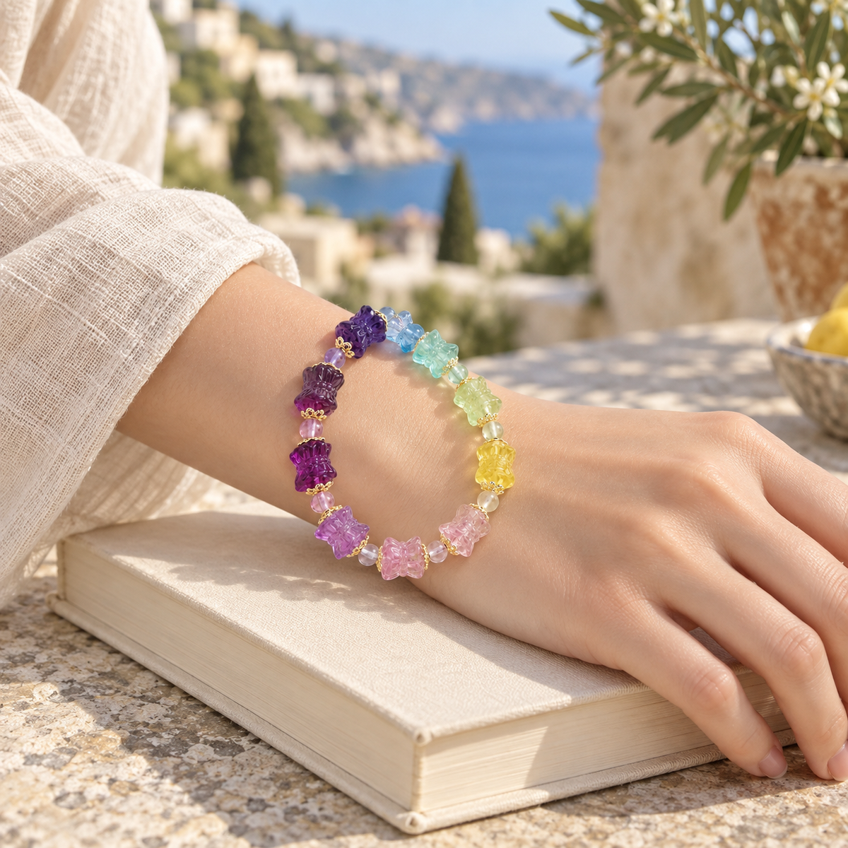 Natural Rainbow Fluorite Lotus Bracelet – Mediterranean book lifestyle view