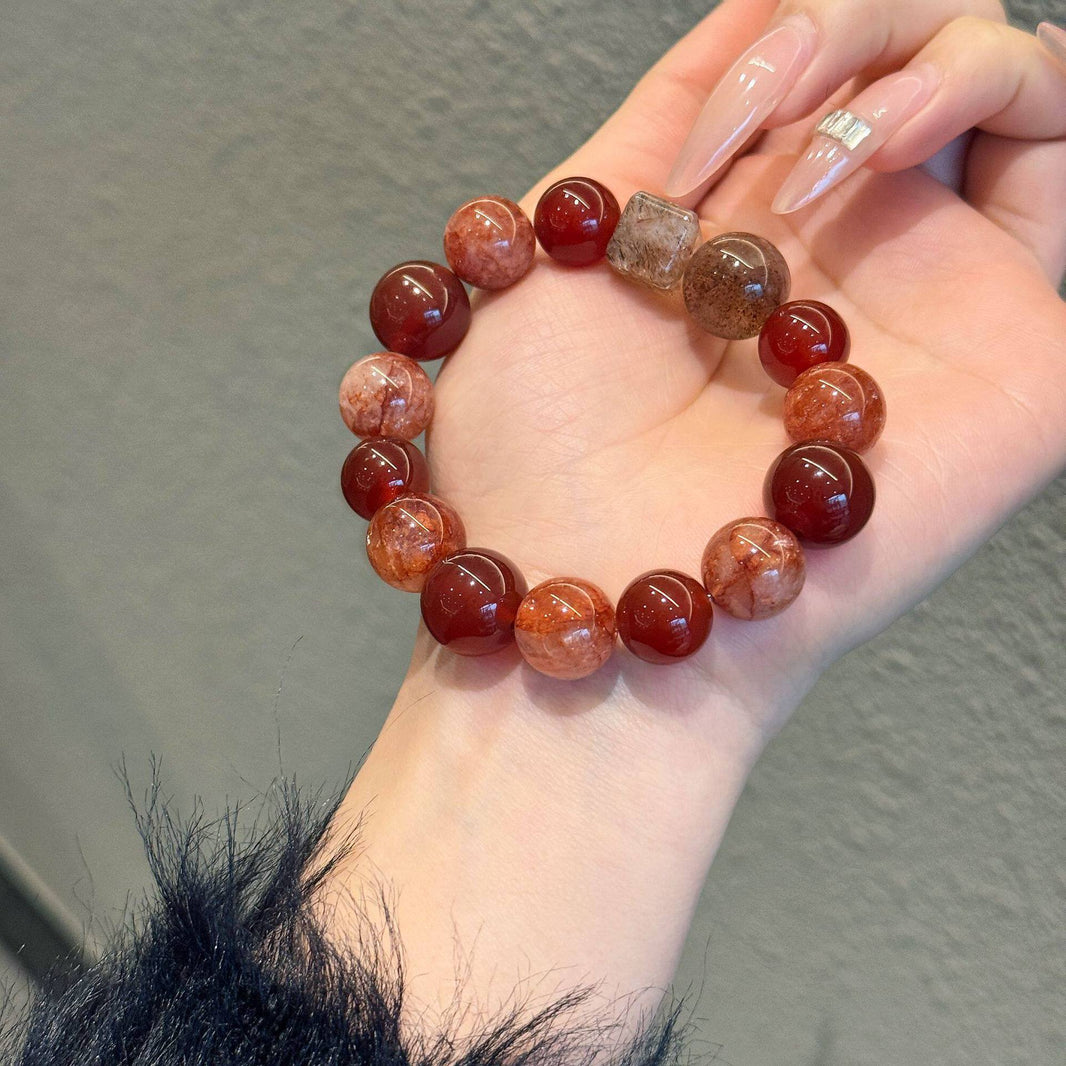 Red agate and inclusion quartz bracelet original lifestyle photograph 1
