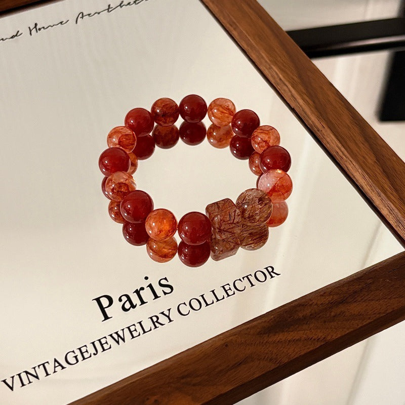 Red agate and inclusion quartz bracelet original lifestyle photograph 2