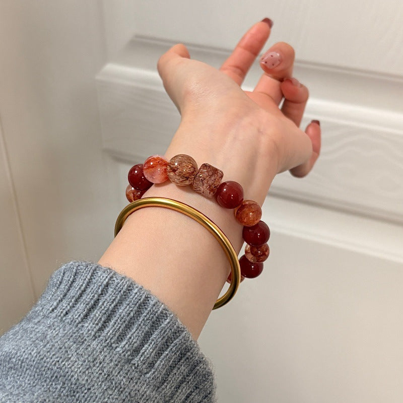Red agate and inclusion quartz bracelet original lifestyle photograph 3