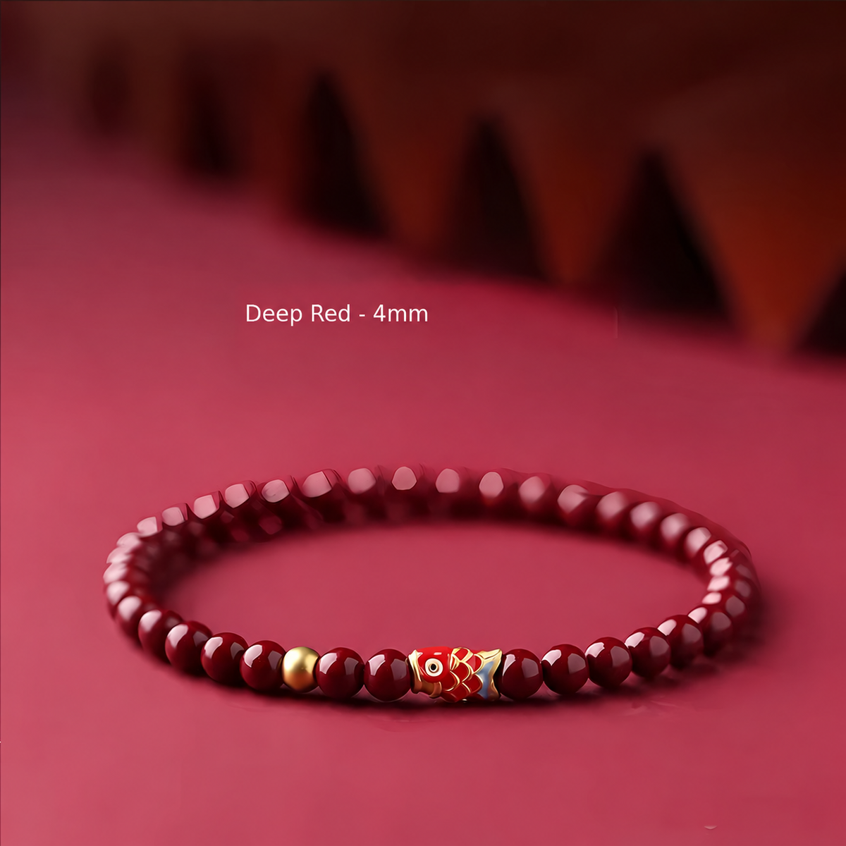 Deep red 4mm bead bracelet with koi charm