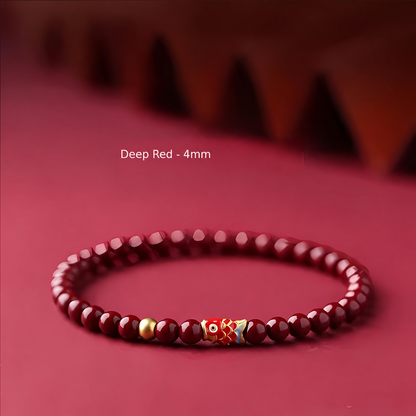 Deep red 4mm bead bracelet with koi charm