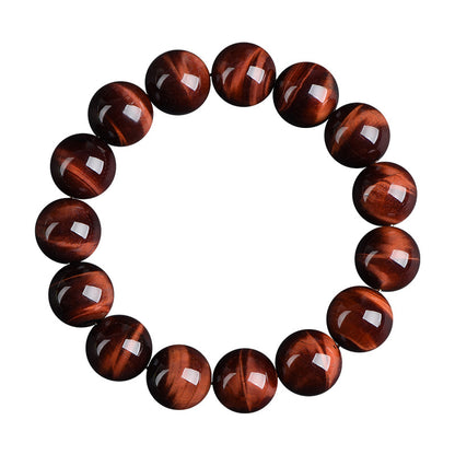 Top view of red tiger’s eye bracelet on white