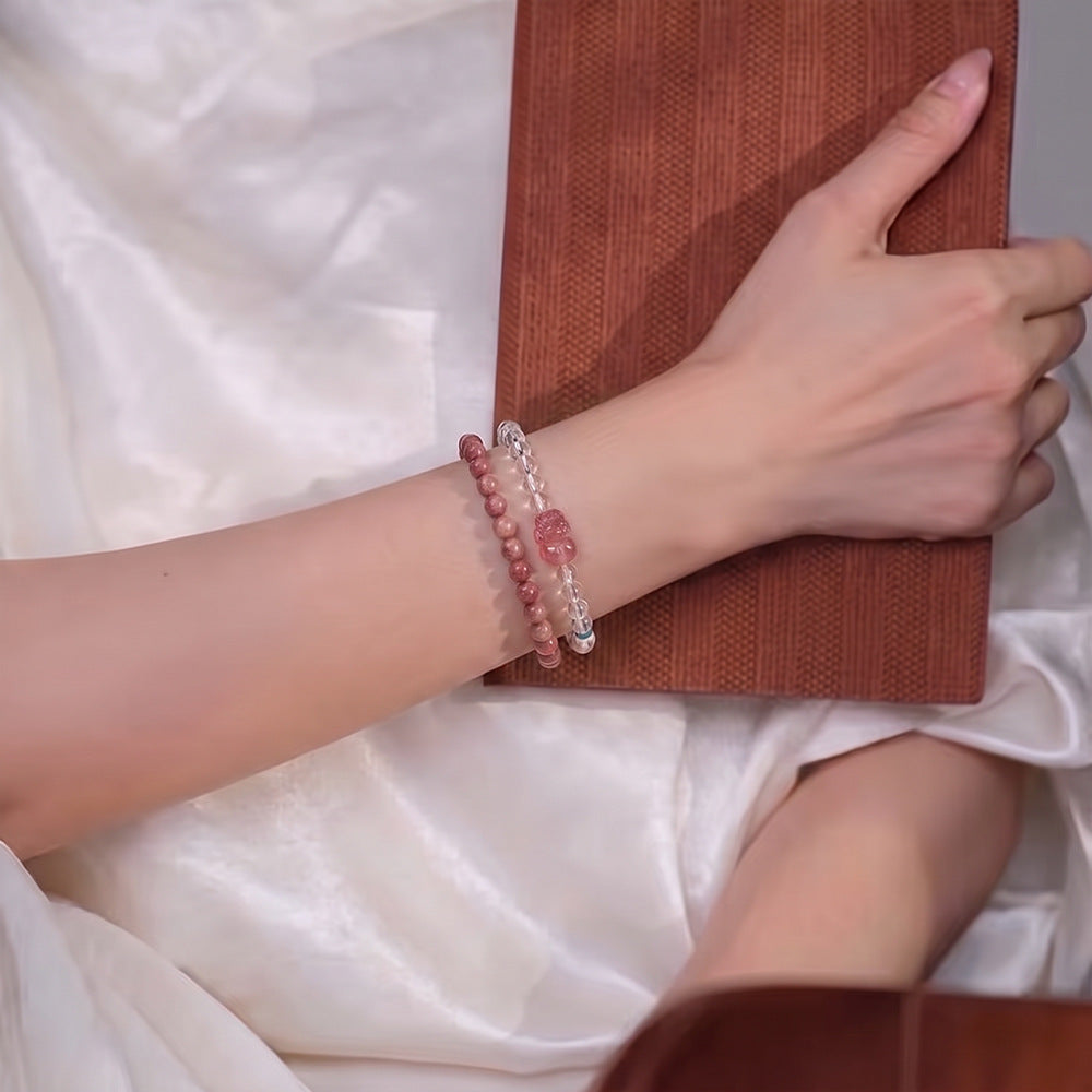 Double-wrap bracelet worn on wrist with Pixiu accent