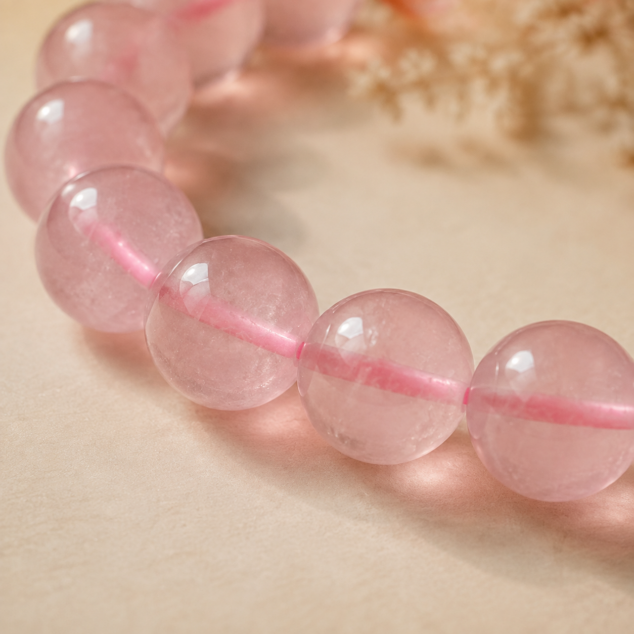 Natural Rose Quartz Bracelet – Pink Cord – bead texture macro detail