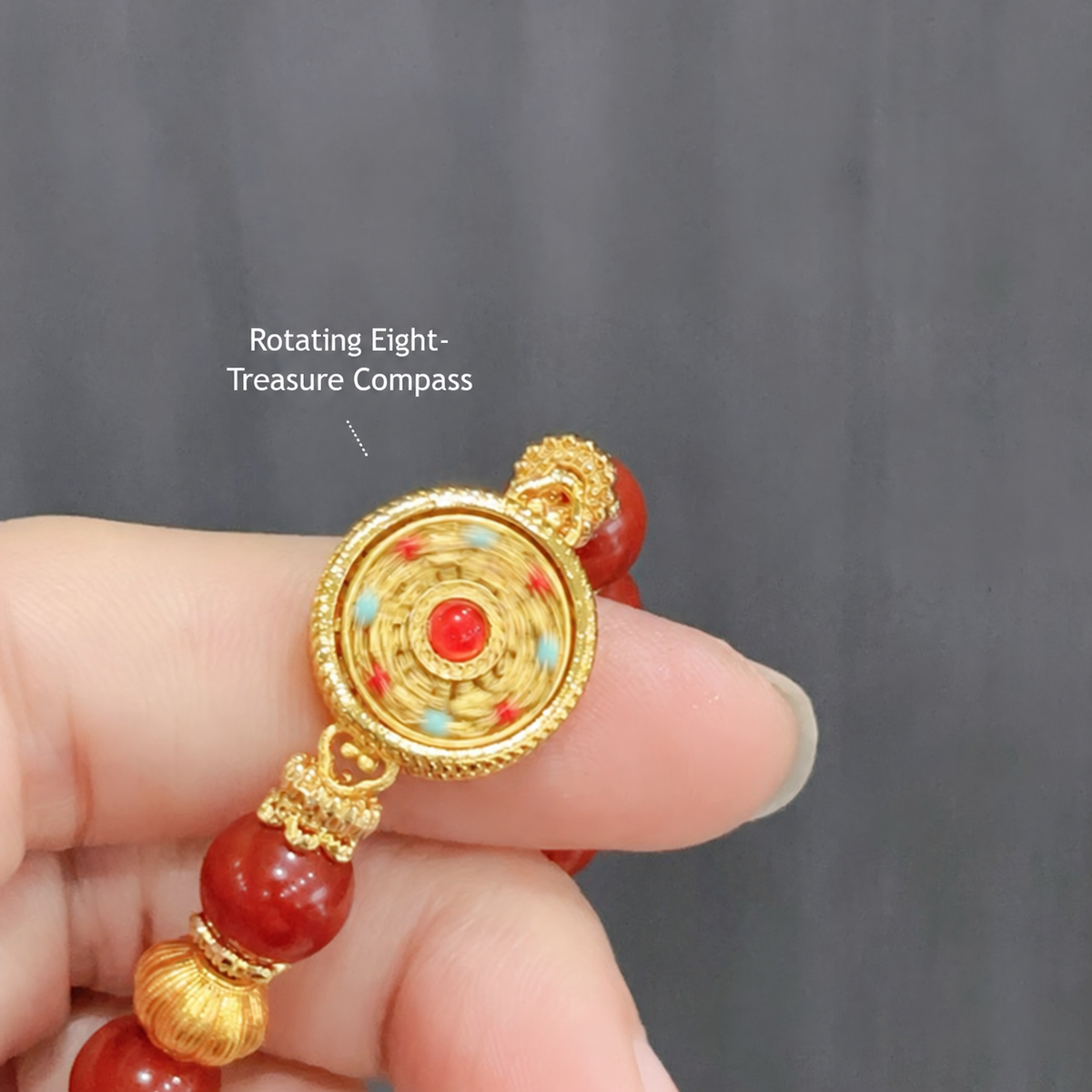 Rotating compass bead bracelet – rotating medallion close-up