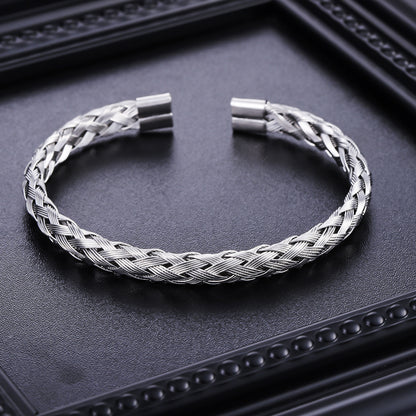 Original detail of braided stainless steel open cuff bracelet