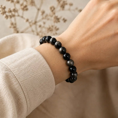 7A Silver Sheen Obsidian Bracelet – Multi-Size – realistic on-wrist view