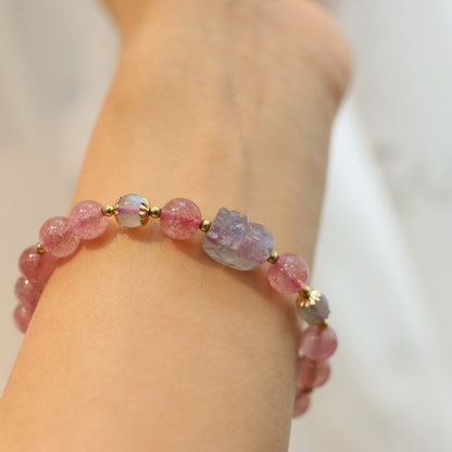 Strawberry quartz and moonstone Pixiu bracelet worn on wrist