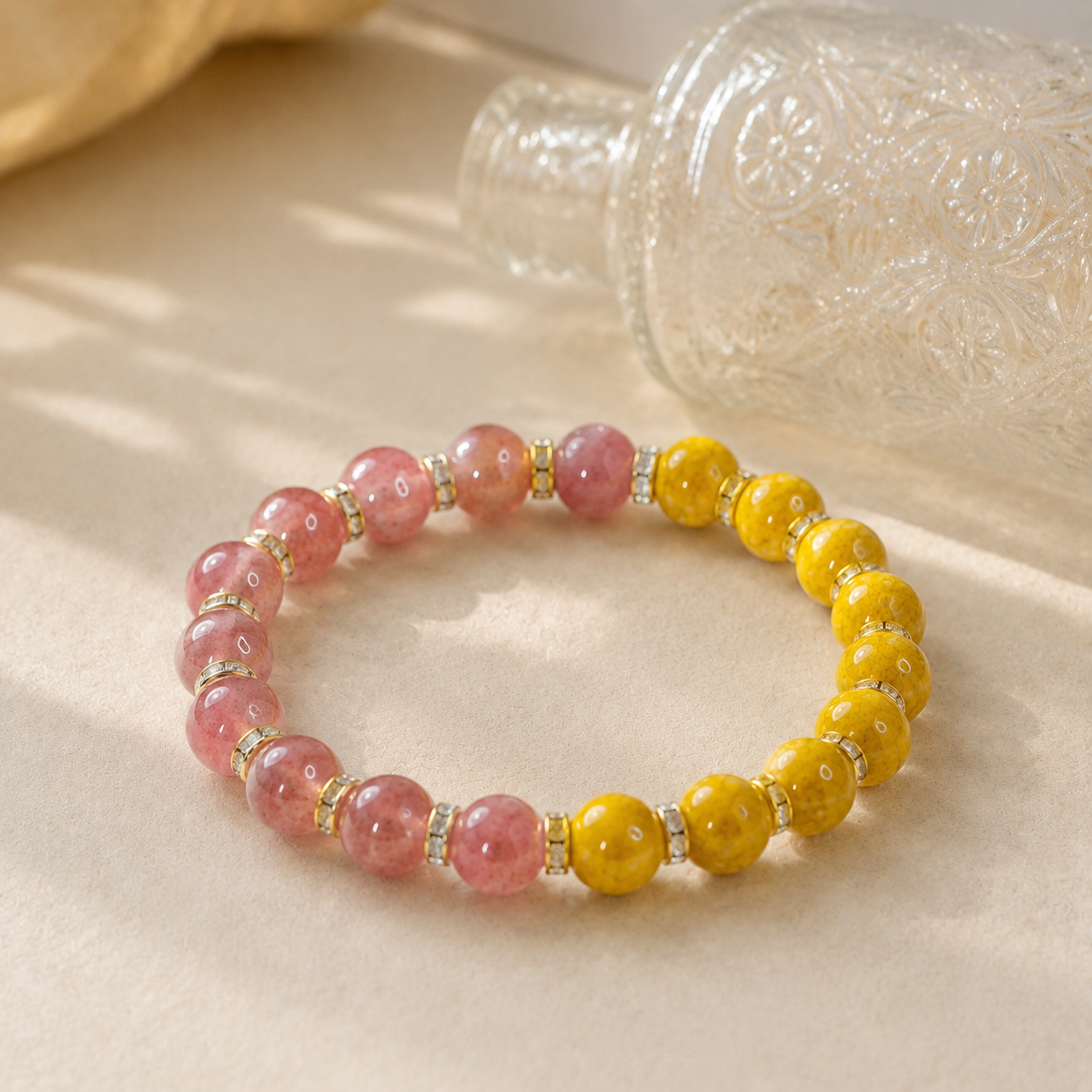 Strawberry Quartz & Cinnabar Bracelet – 8mm – diagonal glass-bottle still life