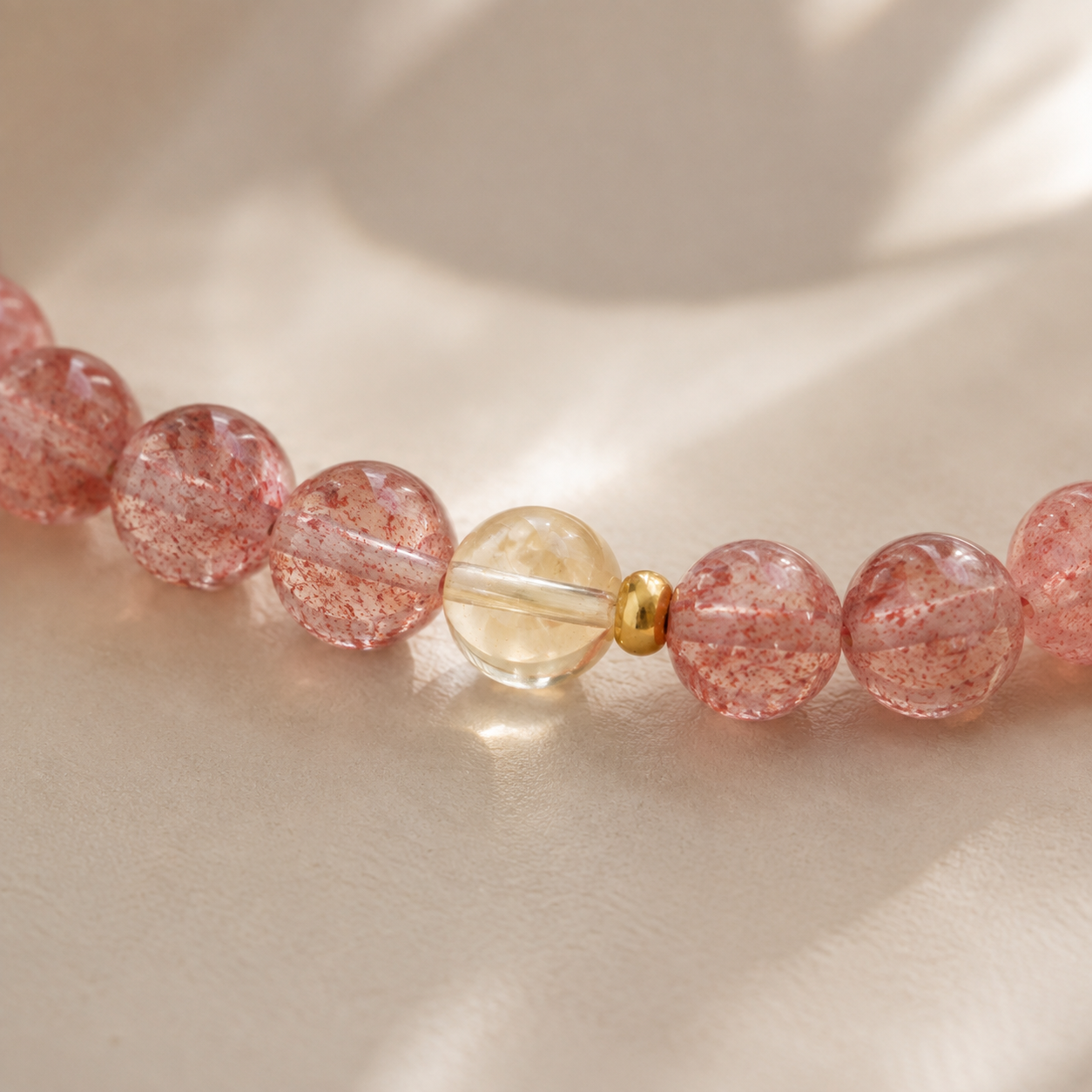 Strawberry Quartz & Citrine Bracelet – 6mm – bead texture macro detail