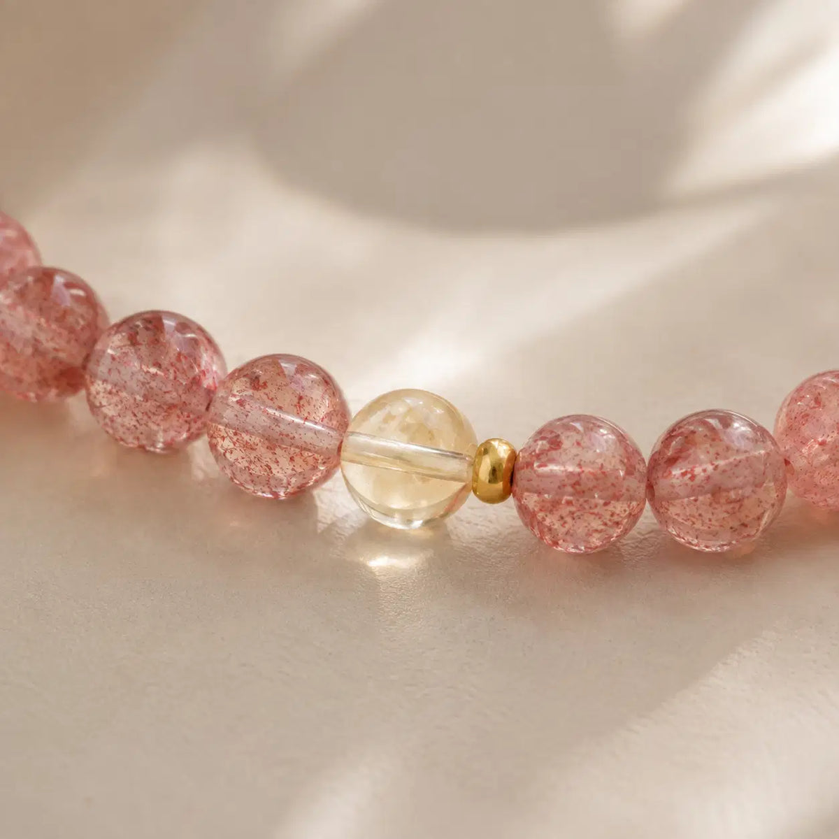 Strawberry Quartz & Citrine Bracelet – 6mm – bead texture macro detail