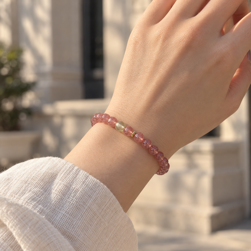Strawberry Quartz & Citrine Bracelet – 6mm worn outdoors with architectural background
