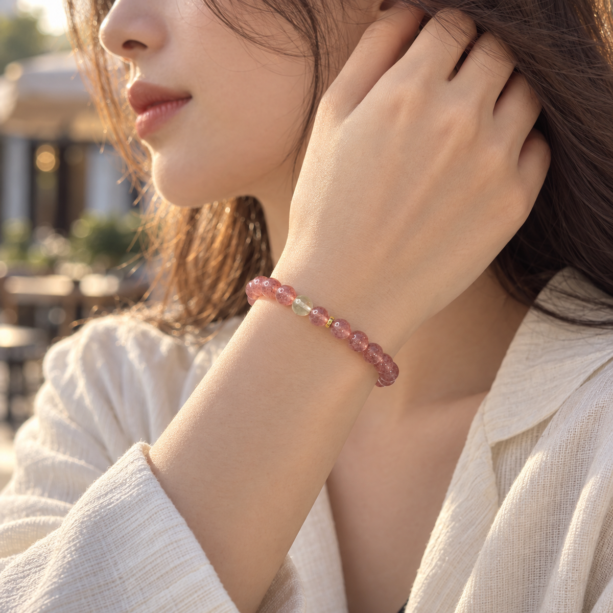Strawberry Quartz & Citrine Bracelet – 6mm worn while touching hair