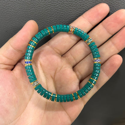 Style 2 teal tablet bead bracelet with colorful gold-tone accent bands